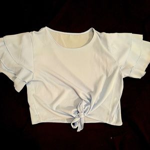 Shein- short sleeve- Color:blue- ruffles on the sleeves and a cute tie in front!